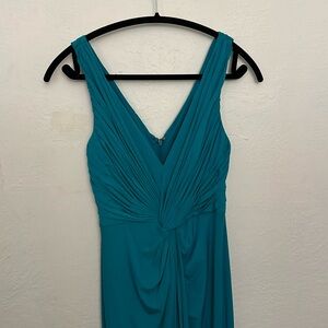 This is a Tadashi turquoise dress. Only worn once!